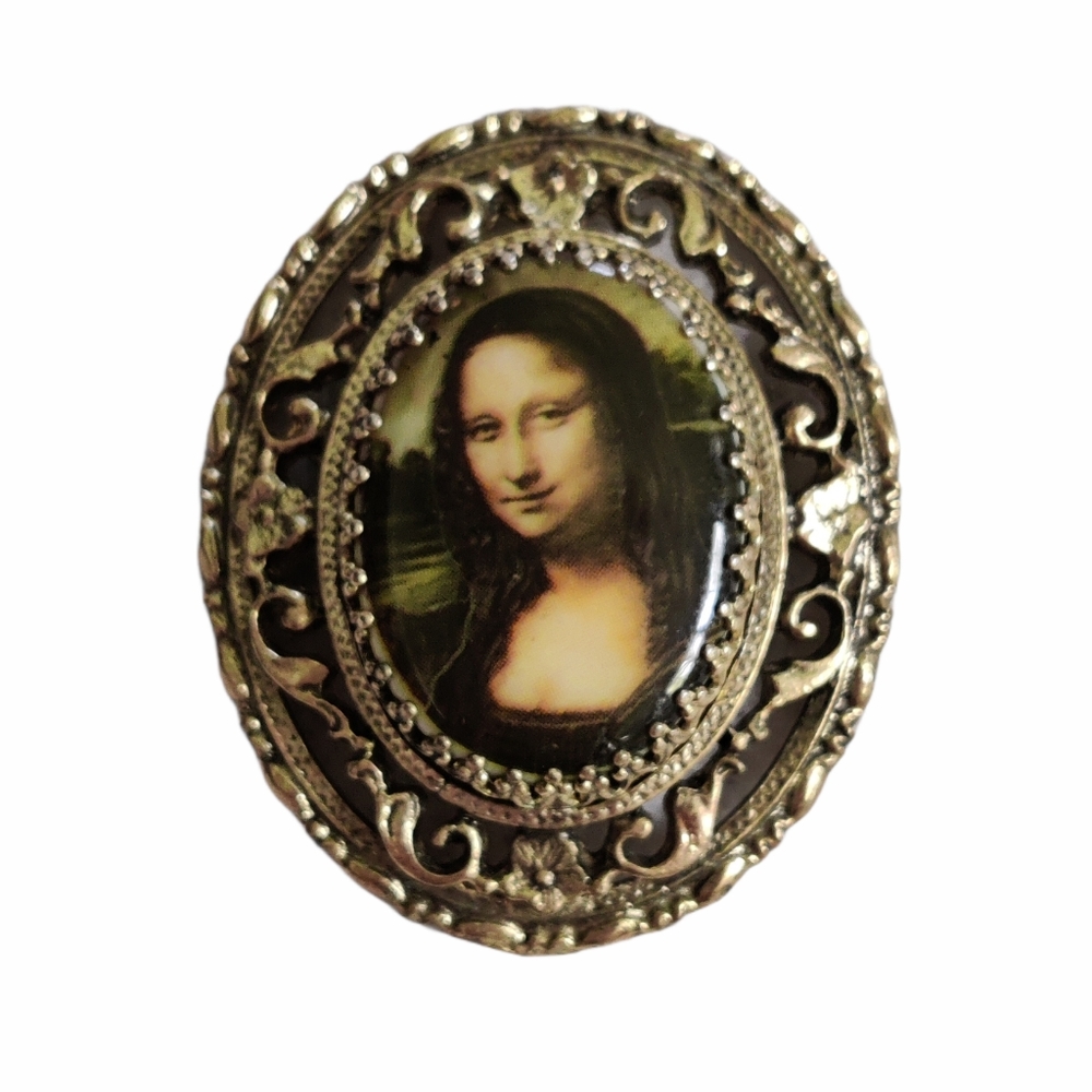 Vintage Mona Lisa brooch
